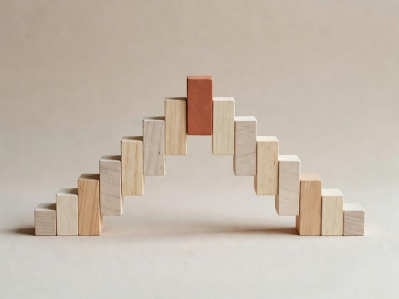 Soft-lit 3D render of an arch-shaped melodic contour built from pale wood blocks and a single high terracotta apex block